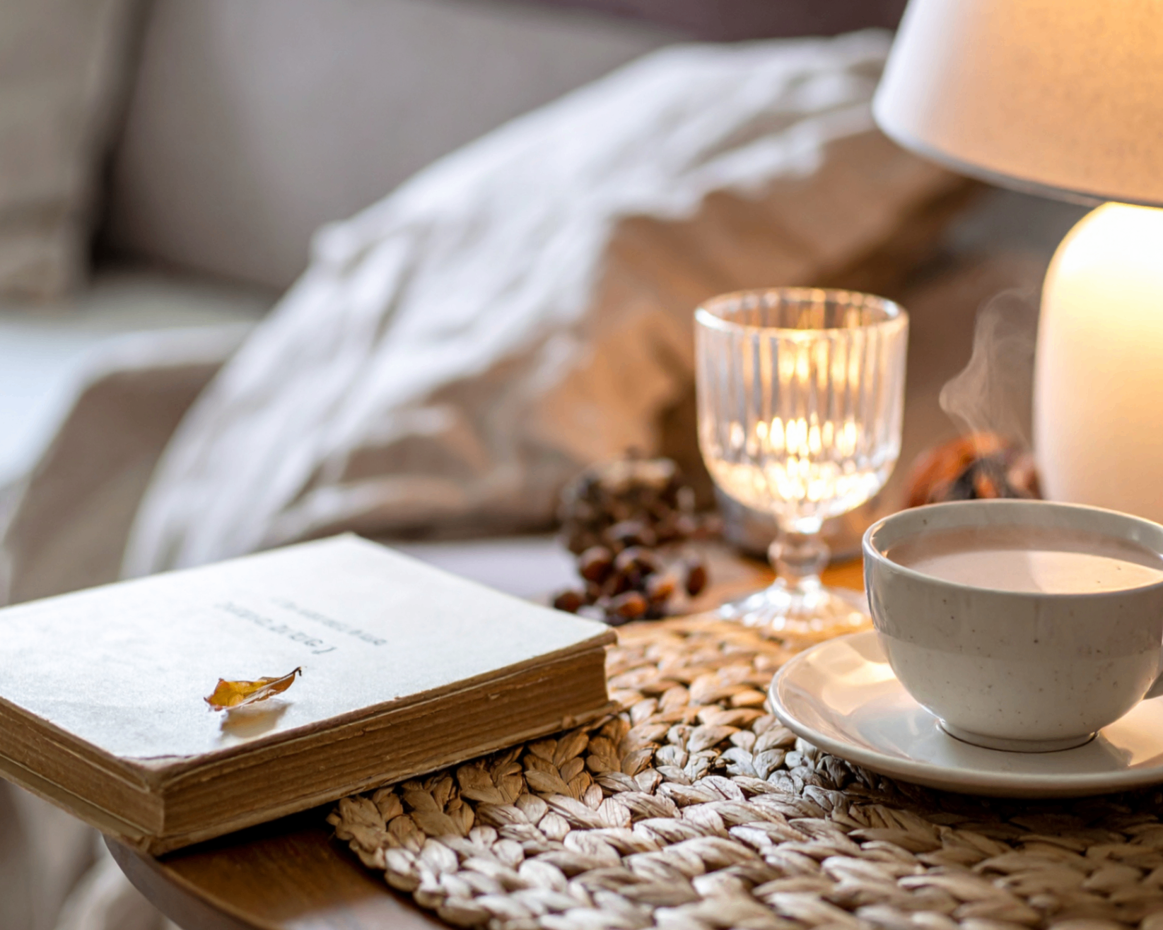 A warm book-and-tea still life used as a poster image for the founder video placeholder